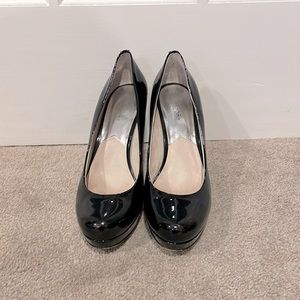 Michael Kors black pumps.             Size 9 1/2 M.